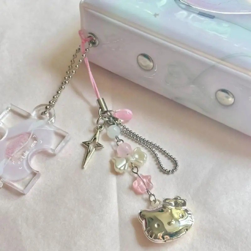 Hello Kitty Phone Charm with Ribbon Bow & Starburst Pendant